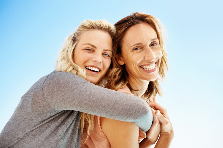 iStock_daughter_embracing_mother